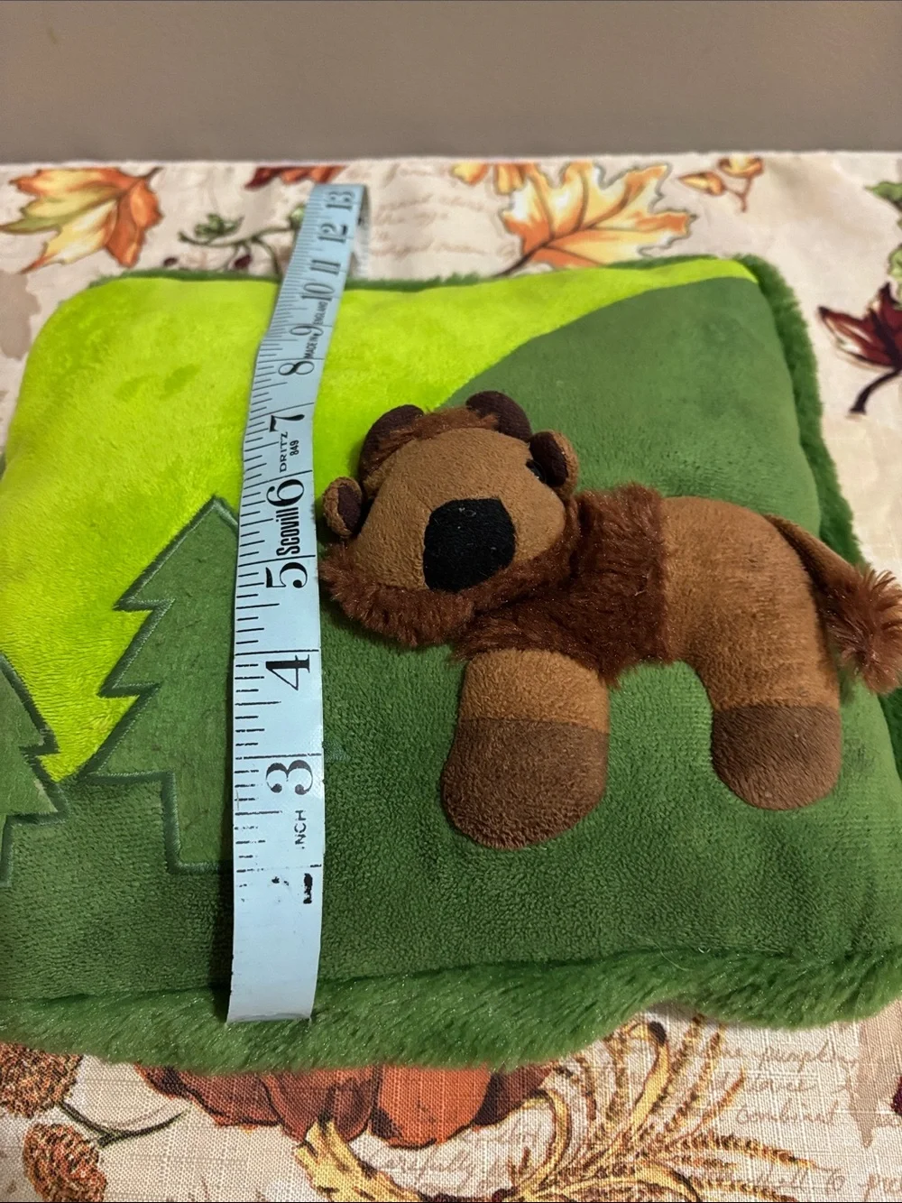Green Woodland Plush Cushion with Attached Brown Buffalo